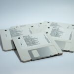 four MacBook diskettes